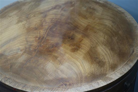 A Regency style banded mahogany drum top book table, H.76cm